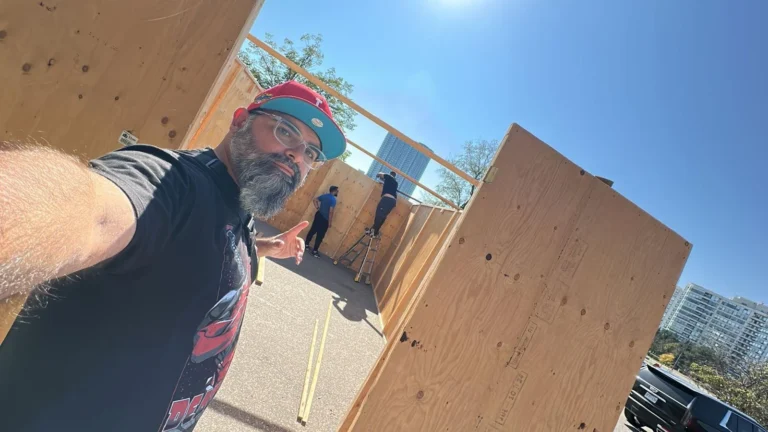 A volunteer's selfie inside the half-built sukkah
